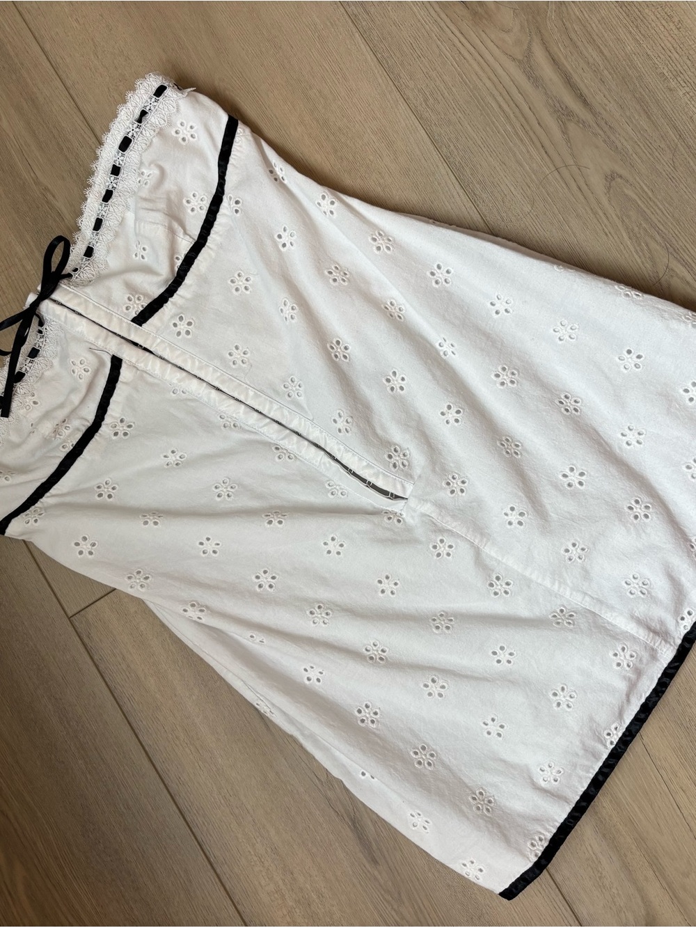 Strapless White Eyelet Mini Dress with Black Trim and Bow - Picture 2 of 3